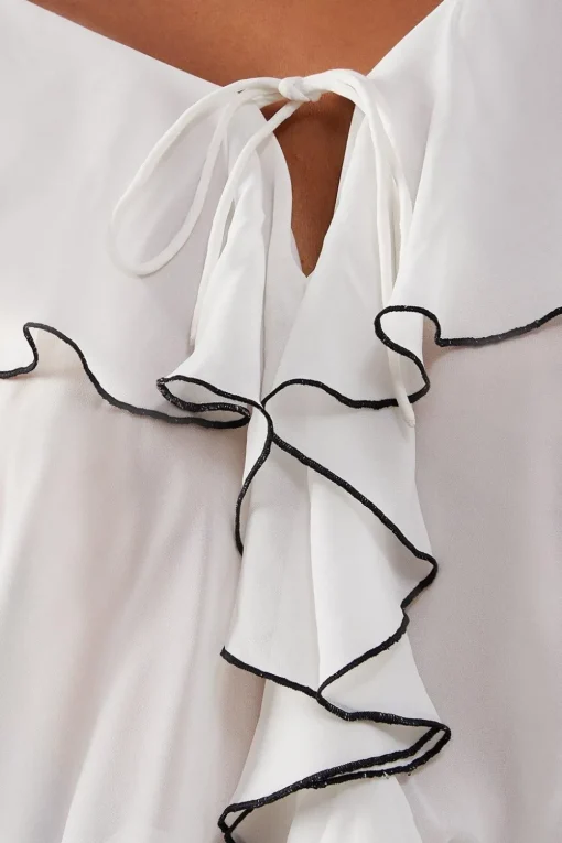 Contrast Stitch Ruffle Flared Sleeve Blouse