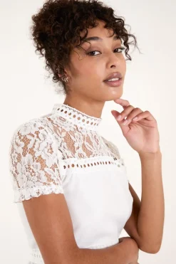 Lace Trimmed Peplum Top