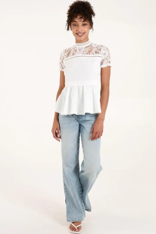 Lace Trimmed Peplum Top