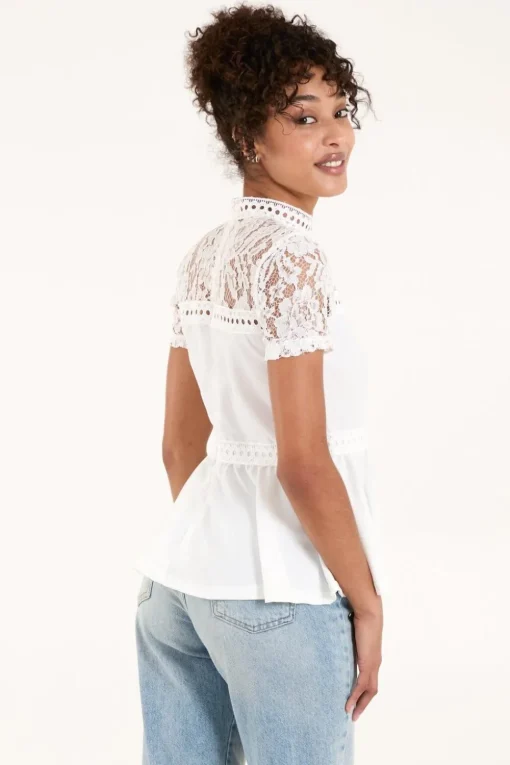 Lace Trimmed Peplum Top