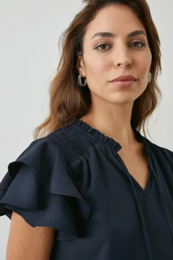 Navy Bubble Hem Flute Sleeve Top