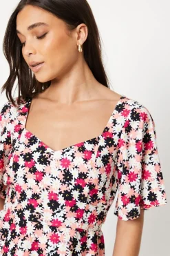 Petite Flutter Sleeve Tie Back Mini Dress