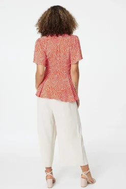 Polka Dot Peplum Blouse