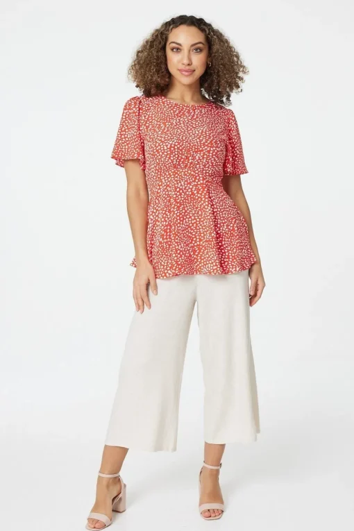 Polka Dot Peplum Blouse