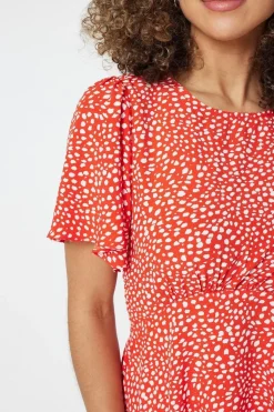 Polka Dot Peplum Blouse
