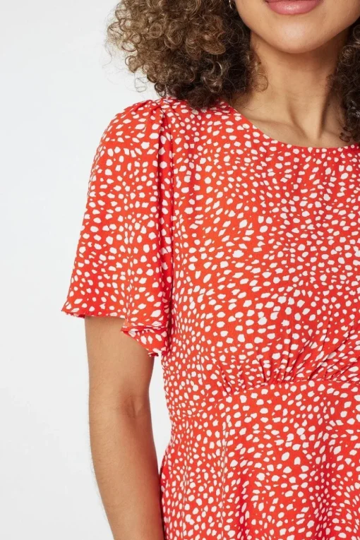 Polka Dot Peplum Blouse